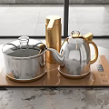 Modern Household Electrical Appliances With Silver Teapot Covered Pot Golden Thermos On Brown Heating Plate