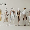 Fashion Mannequins In Different Poses Displaying Diverse Stylish Outfits Against Light Wall