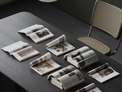 Open Magazines On Black Table Showcasing Photos With Woven Backrest Chair 3d model