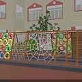 Colorful Playground Equipment With Spider Web Climbing Net And Rings By Wooden Fence Near School Building