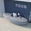 Modern Curved Reception Desk With Striped Surface And Potted Plants In Office Lobby