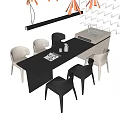 Modern Dining Table And Chairs Set With Black Beige Chairs Hanging Pendant Light And Magazines