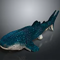 Whale Shark Plush Toy With Blue Body And White Spots On Dark Background