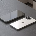 Sleek Apple Smartphones In Gray And White With Four Camera Lenses On Table