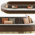Curved Sectional Sofa With Gray Velvet Upholstery And Colorful Accent Cushions On Wooden Frame
