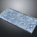 Transparent Rectangular Plaque With Intricate Animal Relief Figures On Dark Background
