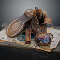 Vintage Leather Boots With Studded Soles On Wooden Pallet And Old Newspaper