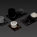 Black Induction Cooktops With Pots And Control Panels For Modern Kitchen Appliances