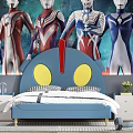 Kids Bed With Blue Cartoon Headboard Yellow Eyes Red Exclamation Mark And Ultraman Wallpaper