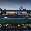 Modern Detached Villa With Glass Facade Illuminated Exterior And Water Reflection On Lawn