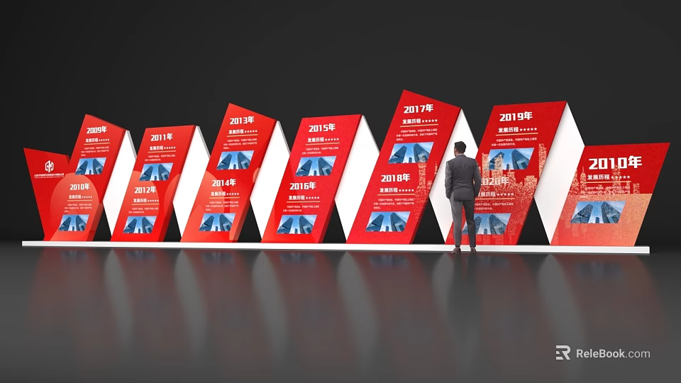 Red Event Exhibition Wall Displaying Different Years Information With Man Viewing 3d model 