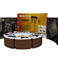 Art Installation With Curved Display Panels And Circular Wooden Table With Colorful Items