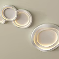 Modern Minimalist White Ceiling Lights Circular Irregular Shapes Warm Yellow Light On Light Colored Wall 3d model