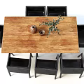 Wooden Dining Table Set With Black Chairs And Tabletop Greenery Decor Items