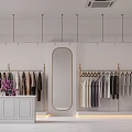 Elegant Clothing Store With White Walls Golden Racks Mannequin Brown Sofa And Purple Flowers