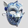 Blue And White Ceramic Mask With Intricate Floral Patterns And Ornate Decorations