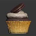 Chocolate Cupcake With Yellow Paper Liner White Cream Frosting And Oreo Cookie Topping