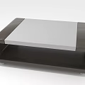 Modern Coffee Table With Dark Wooden Frame And Light Colored Sleek Top Design