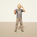 Young Man In Gray Tshirt And Khaki Pants Holding Purple Item