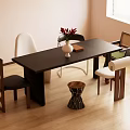 Modern Black Dining Table Set With Various Designed Chairs Vase And Wooden Tray