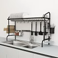Black Dish Rack Organizes Kitchen Utensils And Dishes Above Sink