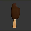 A Bitten Chocolate Ice Cream Bar on Wooden Stick Against Dark Background