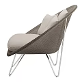Modern Wicker Leisure Chair With Beige Cushions And Silver Metal Legs