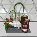 Decorative Display Cabinet Shelf With Green Vines Oranges Floral Decor And Tablecloth