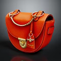 Orange Leather Saddle Bag With Metal Chain Lock Clasp And Textured Surface Design