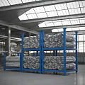 Industrial Equipment Heavy Duty Storage Racks with Blue Frames Holding Metal Coils in Factory