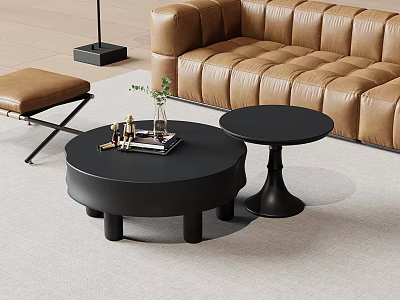 Black Round Coffee Table with Vase and Books in Living Room with Brown Leather Sofa 3d model