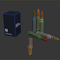 Military Bullets With Green Casings And Orange Tips Next To Blue Box