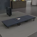 Portable Blue Folding Bed With Stripe Mattress Black Frame And Magazine On Top