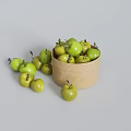 Fresh Green Apples in Paper Container with Leaves and Scattered Around