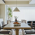 Modern Living Dining Room Interior With Black Leather Sofa Wooden Bookshelf And Green Plants