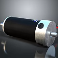 Black And Silver Cylindrical Electric Motor With Metal End Caps And Rotating Shafts