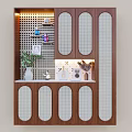 Wooden Shoe Cabinet Interior With Oval Doors Perforated Panel And Decorative Plants