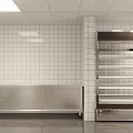 Commercial Kitchen Interior With Tiled Walls Stainless Steel Workbenches And Storage Cabinets