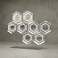 Transparent Hexagonal Display Units With Metal Frames On Grey Background And Concrete Floor