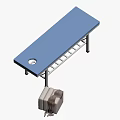 Blue Padded Treatment Table With Central Hole And Metal Frame Near Sofa