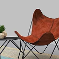 Orange Leisure Chair With Leather Upholstery Black Metal Legs Hexagon Table Plants And Floor Lamp
