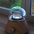 Illuminated Decorative Lamp With Transparent Glass Dome And Wooden Base On Window Sill