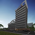 Modern Multi Storey Hospital Building Exterior With Glass Curtain Walls Red Signage And Trees