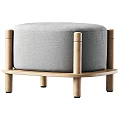 Round Gray Upholstered Sofa Stool With Wooden Legs And Minimalist Design