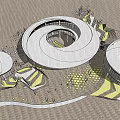 Modern Cultural Center Building With Circular Glass Facade And Surrounding Trees