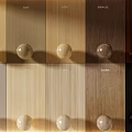 Wood Wall Paneling With Various Tones And Decorative Knobs