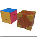Colorful Cubes With Blue Top Yellow Pink Sides And Red Wooden Stack With Golden Corners