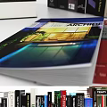 Stacked Books And Magazines Display With Various Colorful Covers And Designs