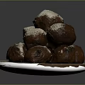 Stacked Golden Brown Fried Pastries Topped with Powdered Sugar on Silver Plate