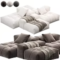 Modern Modular Sofa In White And Gray With Tufted Design Plush Cushions And Throw Blanket